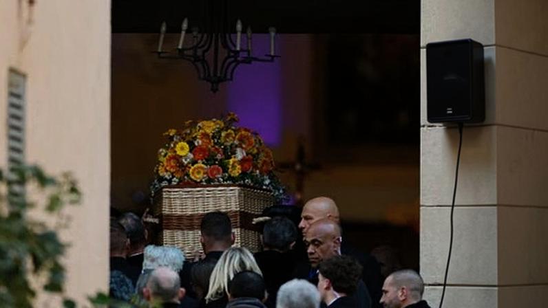 Pallbearers carry Brigitte Bardot’s coffin into the Notre-Dame de l’Assomption church in Saint-Tropez.