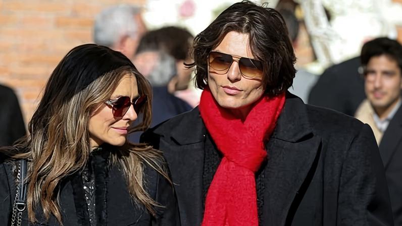 The actor Liz Hurley and her son, Damian, at the funeral in Rome on Friday.