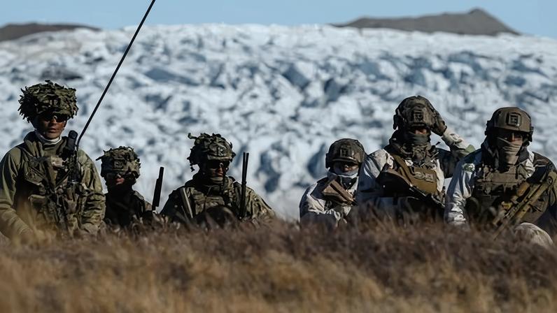 Danish troops practise looking for potential threats during a military drill as Danish, Swedish and Norwegian home guard units take part in joint military drills in Kangerlussuaq, Greenland.