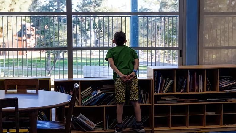 A youngster at a childcare center in Los Angeles. The administration is cutting funds to five Democratic-run states.