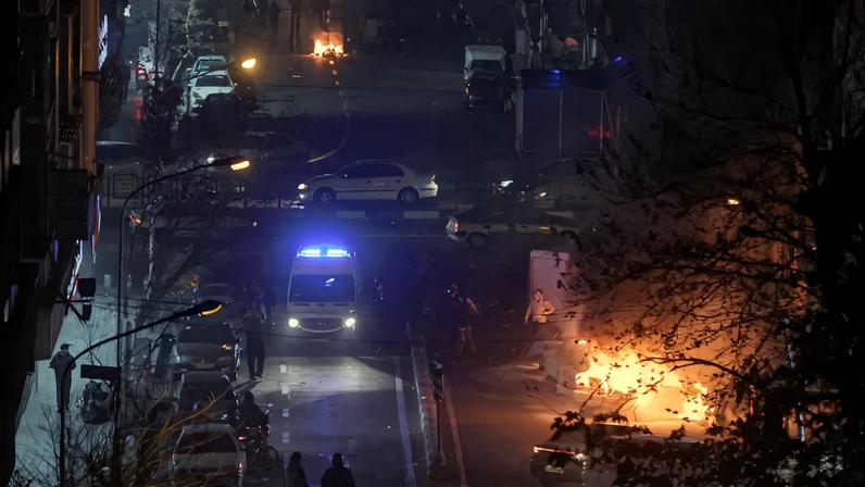 Cars burn in a street during a protest over the collapse of the currency's value, in Tehran, Iran, January 8, 2026. Stringer/WANA (West Asia News Agency) via REUTERS/File Photo