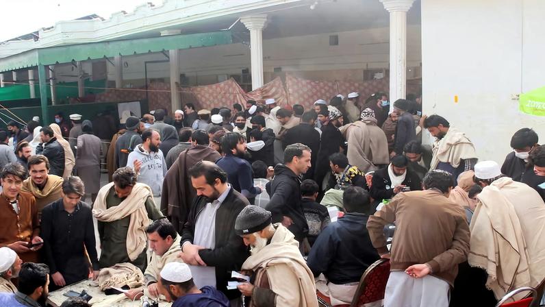 Residents from Tirah valley, who fled a remote mountainous region bordering Afghanistan, gather to get themself registered, in Bara, Khyber District of Khyber Pakhtunkhwa province, Pakistan, January 30, 2026. REUTERS/Muhammad Amin Afridi