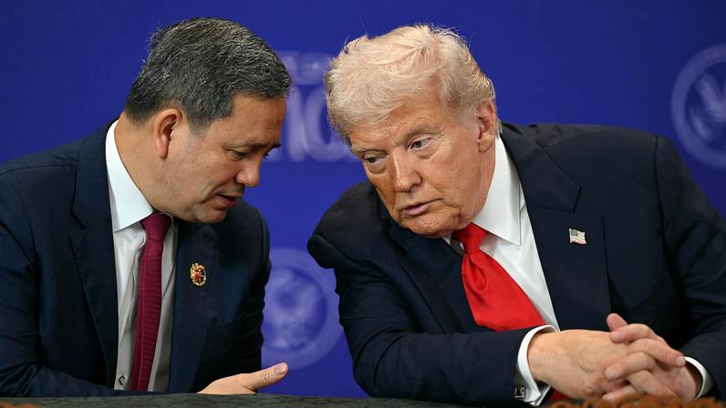 U.S. President Donald Trump listens to Cambodia's Prime Minister Hun Manet ahead of a ceremonial signing of a ceasefire agreement between Thailand and Cambodia on the sidelines of the 47th Association of Southeast Asian Nations (ASEAN) Summit in Kuala Lumpur, Malaysia, October 26, 2025. Mohd Rasfan/Pool via REUTERS