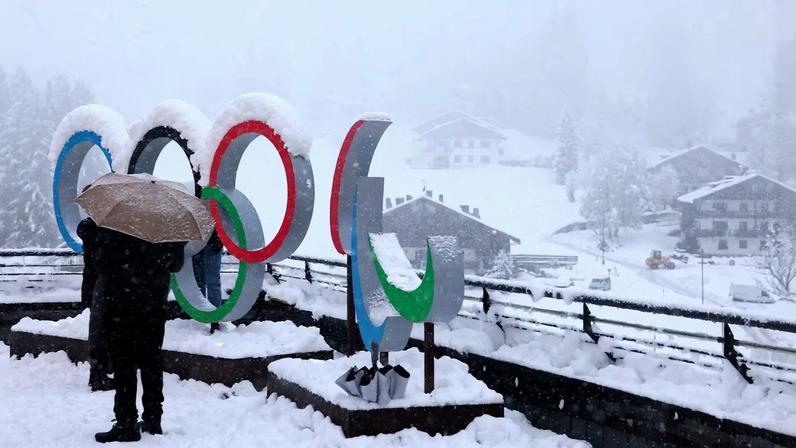 Milano Cortina 2026 Winter Olympics - Previews - Cortina d'Ampezzo, Italy - January 25, 2026 General view of the Olympic rings and the Paralympics Agitos logo covered in snow ahead of the Milano Cortina 2026 Winter Olympics REUTERS/Claudia Greco