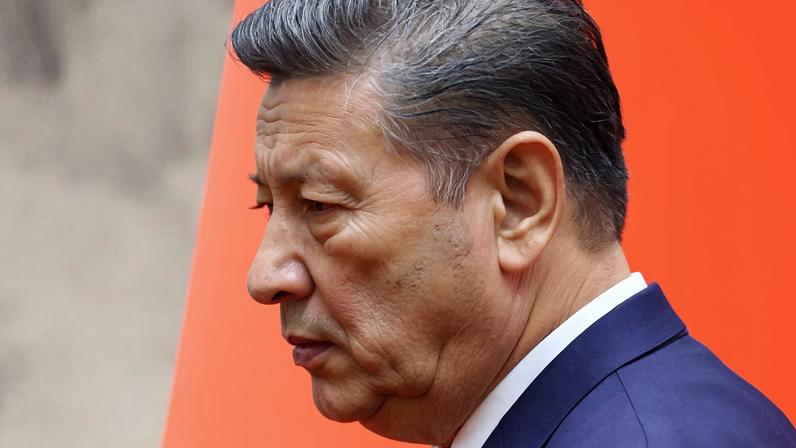 Chinese President Xi Jinping looks on as he walks following a signing ceremony for agreements and contracts at the Great Hall of the People in Beijing as part of a three-day visit to China, December 4, 2025. REUTERS/Sarah Meyssonnier/Pool/File Photo