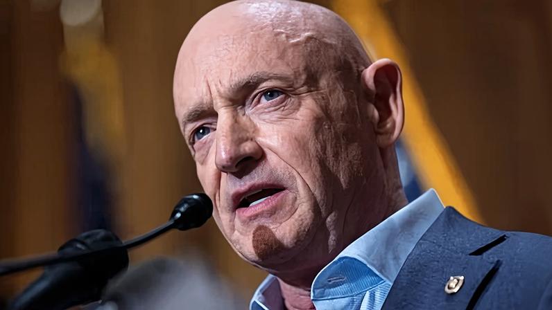 Senator Mark Kelly during a news conference at the Capitol in Washington DC on 1 December 2025.