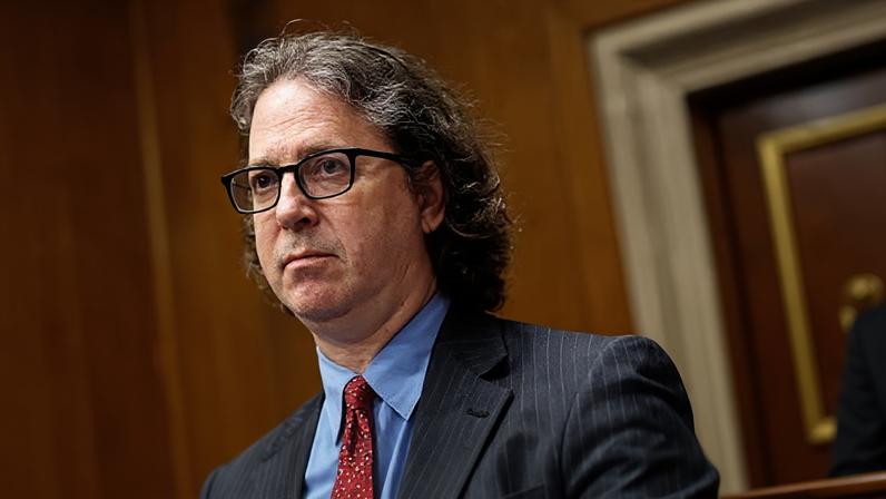 Attorney Mark Zaid, the lawyer for former CDC director Susan Monarez, listens as she testifies before a Senate committee in Washington DC on 17 September 2025.