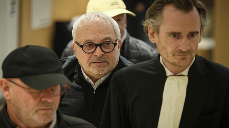 Joël Guerriau (centre) arriving at court in Paris on Monday.