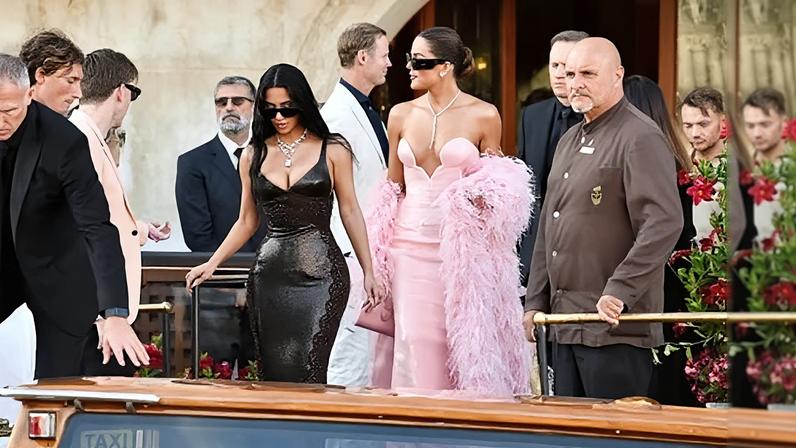 Kim Kardashian, left, and Khloé Kardashian board a water taxi in Venice during the wedding celebrations of Jeff Bezos and Lauren Sánchez.