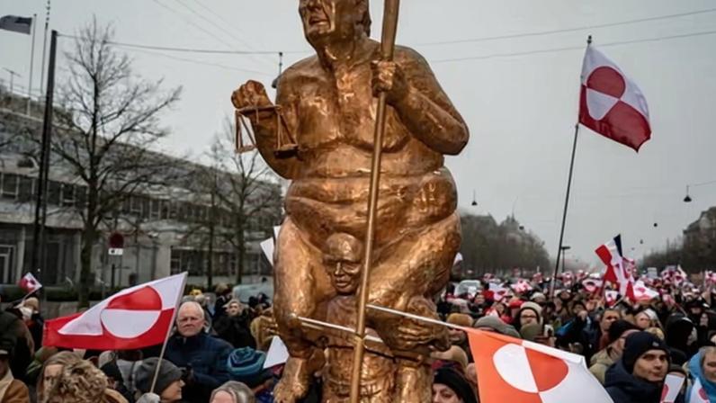 A statue of Trump, Greenlandic and Danish flags and placards at a protest outside the US embassy in Copenhagen last weekend.