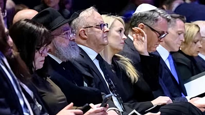 ‘I am deeply and profoundly sorry’: Anthony Albanese, centre, at the memorial service at the Sydney Opera House.
