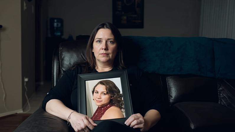 Robyn Cory with a photo of her daughter, Kristen, at home in Houston, Texas, on 1 February 2024.