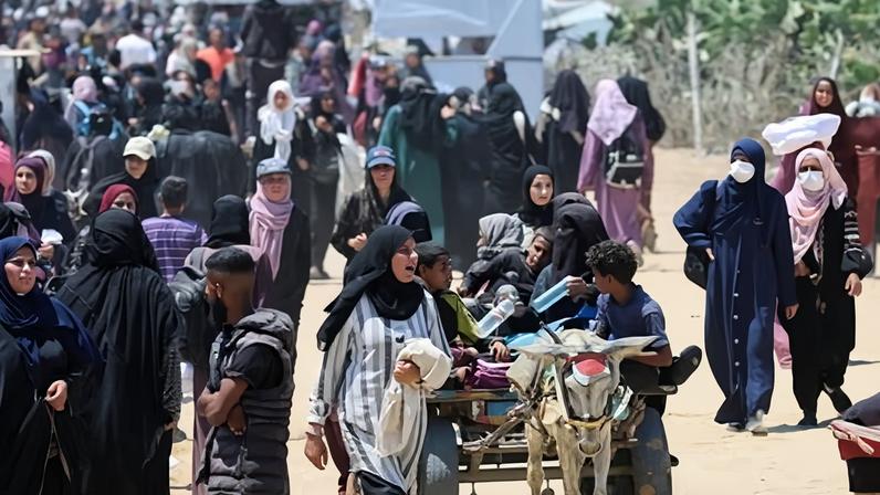Palestinians near Rafah in the southern Gaza Strip on 24 July 2025.