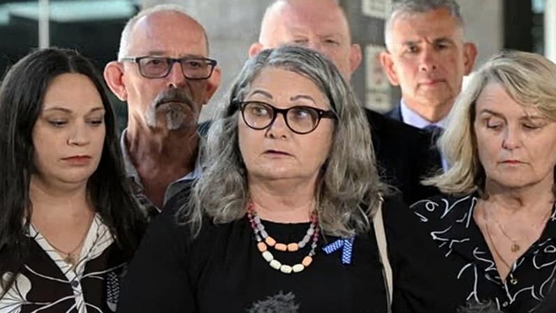 Judy McCrow (centre) and family of murdered officers Rachel McCrow and Matthew Arnold after the Wieambilla inquest findings were delivered.
