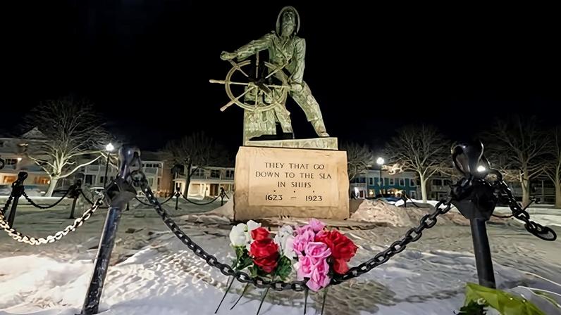 Flowers at Gloucester’s Fisherman's Memorial after a fishing boat from the port city went missing with multiple people onboard, on 30 January 2026.