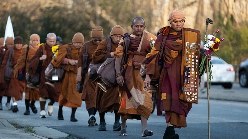 The Venerable Bhikkhu Paññākāra leads Buddhist monks as they continue their Walk for Peace in Charlotte, North Carolina, on Thursday.