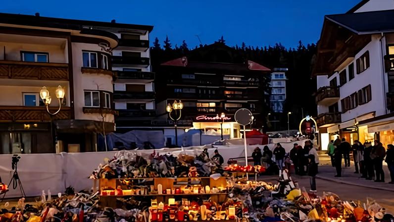 Flowers and candles in tribute to the victims after the fire at Le Constellation bar in Crans-Montana, Switzerland.