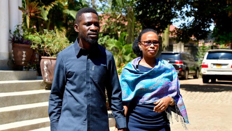 Polls open in Uganda elections as voters are to choose president and parliament, in Kampala