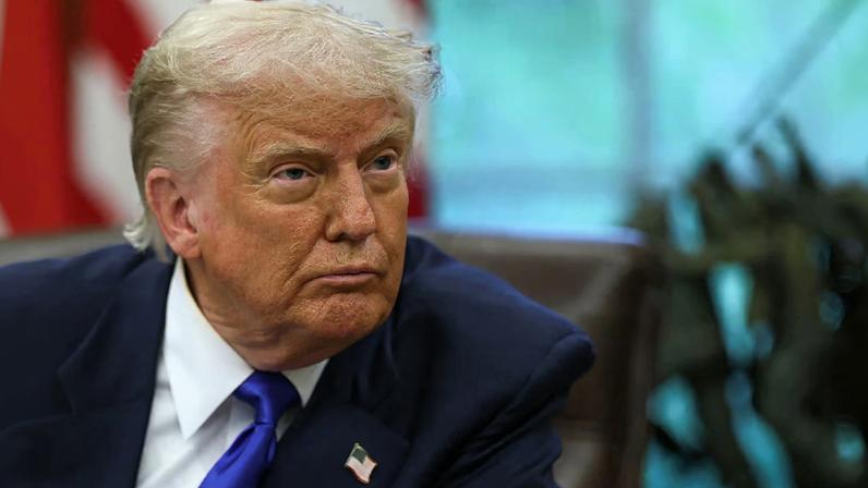 U.S. President Donald Trump looks on as he signs executive orders and proclamations in the Oval Office at the White House, in Washington, D.C., U.S., May 5, 2025. REUTERS/Leah Millis/File Photo