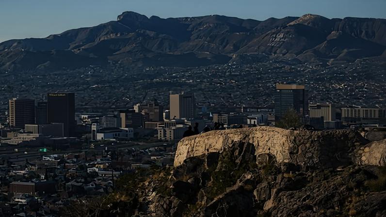 People look over the El Paso skyline in Texas in 2023.