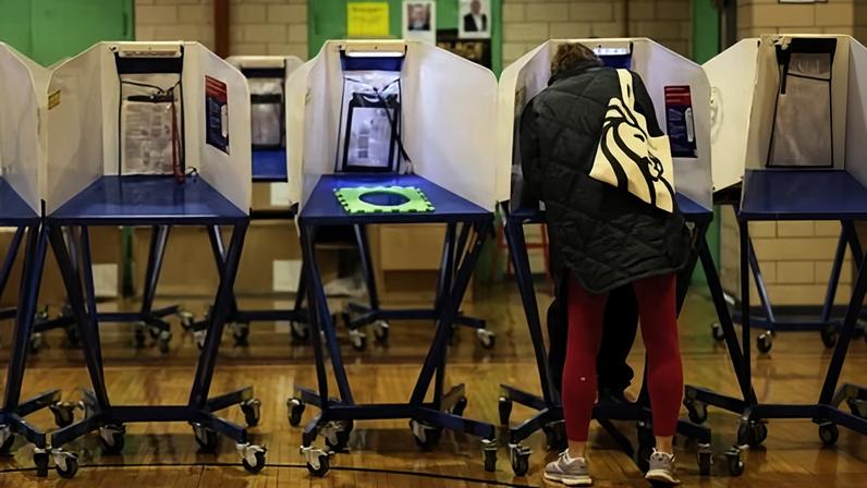 People vote on election day in Brooklyn, New York, on 4 November 2025.