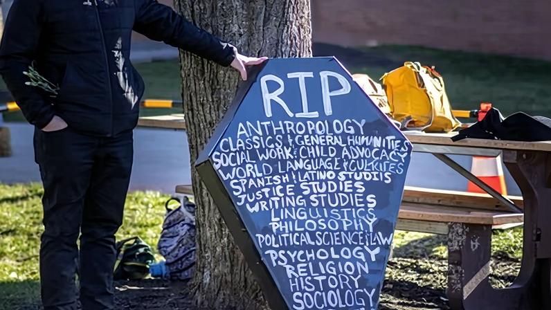 Montclair State University students hold a mock funeral.