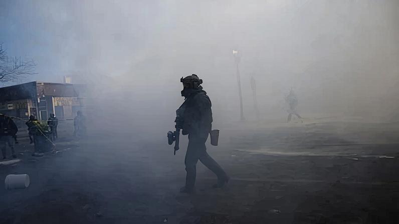 Tear gas fills the air on Nicollet Avenue in Minneapolis on 24 January 2026.
