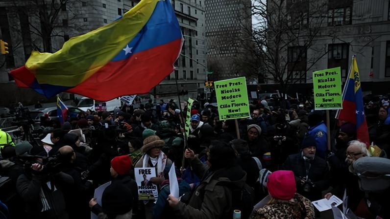 People protest against US strikes against Venezuela and the capture of Venezuelan President Nicolas Maduro outside court in New York on 5 January 2026.