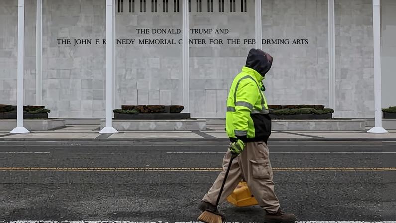 A worker walks past the Kennedy Center in Washington DC on 29 December 2025.