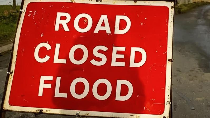 Flooding, or the likelihood of flooding on surrounding roads, has caused the school closures, staff said