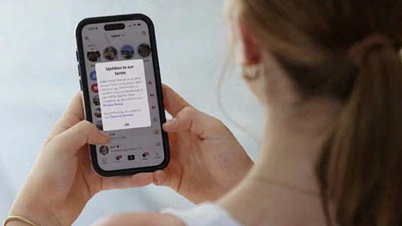 A teenager in Australia, where social media has been banned for under-16s.