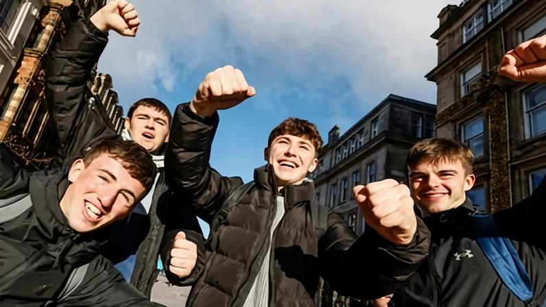 Caledonian University celebrate Scotland’s qualification for the World Cup after their 4-2 victory over Denmark.