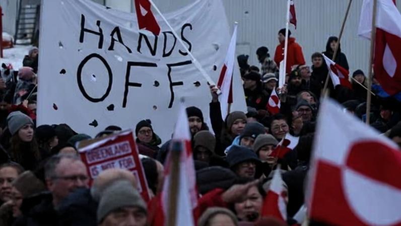 People march to protest against Donald Trump and his announced intent to acquire Greenland, on 17 January 2026 in Nuuk, Greenland.