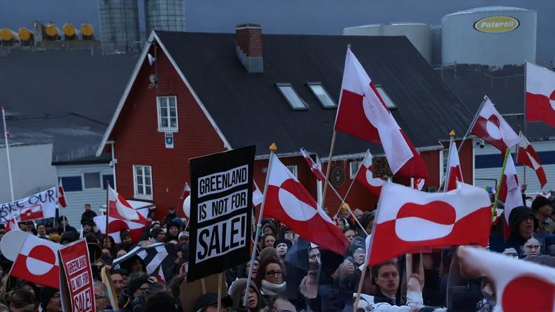 People gather in front of the US consulate in Nuuk, Greenland.