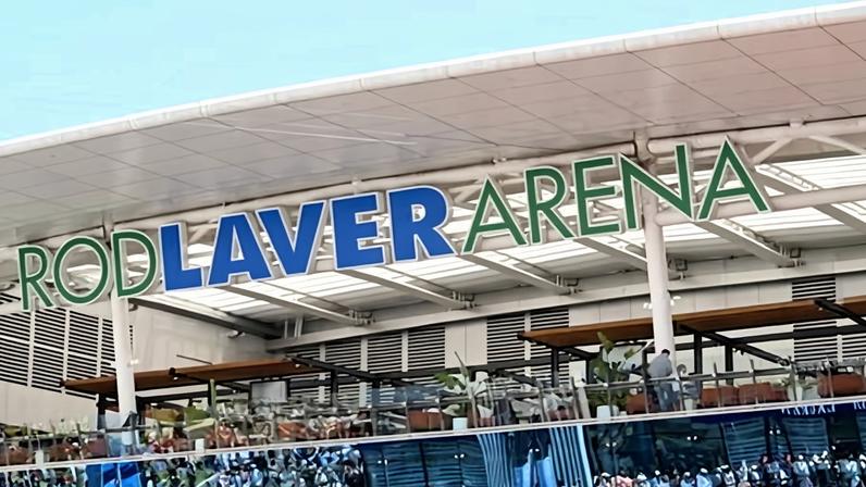 Crowds of fans are seen in the glass mirrors of Rod Laver Arena at lunchtime during the 2026 Australian Open at Melbourne Park