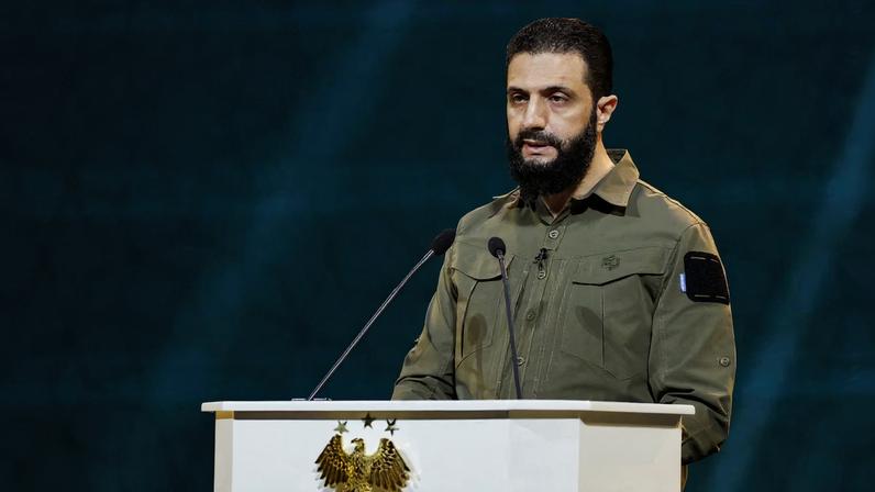 Syria's President Ahmed al-Sharaa delivers a speech on the first anniversary of Bashar al-Assad's fall