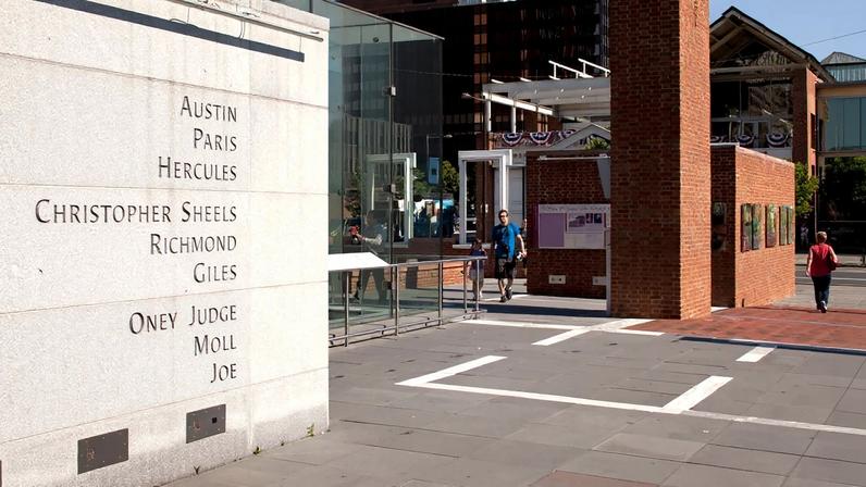 A memorial wall at the President's House Site in Independence National Historical Park in Philadelphia features the names of nine enslaved people who lived at the site in George Washington's household