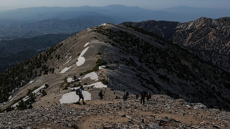 Hikers descending the Devils Backbone trail on Mount Baldy on 22 May 2022.
