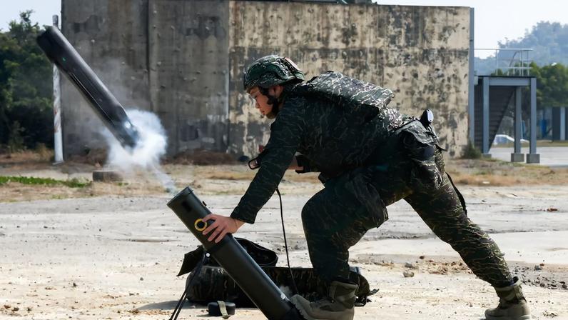 Soldiers operate a Taiwan-made attack drone during an annual military exercise ahead of the Lunar New Year in Kaohsiung