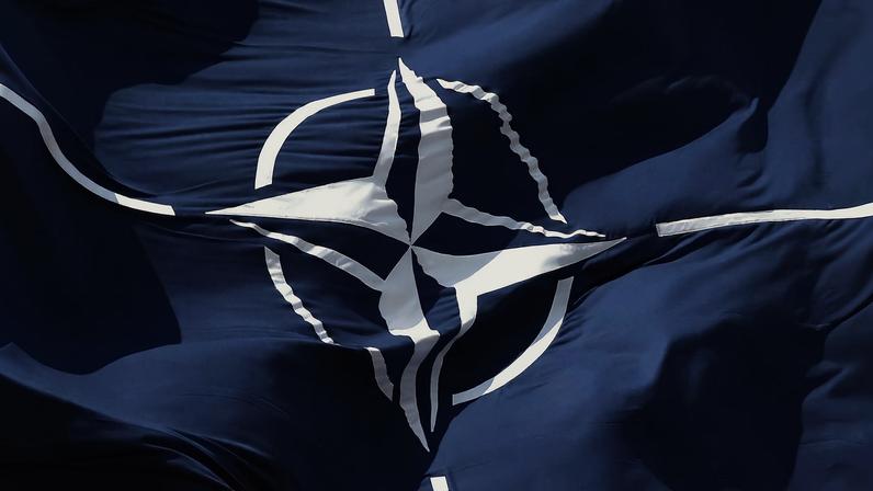 A NATO flag flutters at NATO headquarters in Brussels, Belgium April 2, 2025. REUTERS/Yves Herman/File Photo