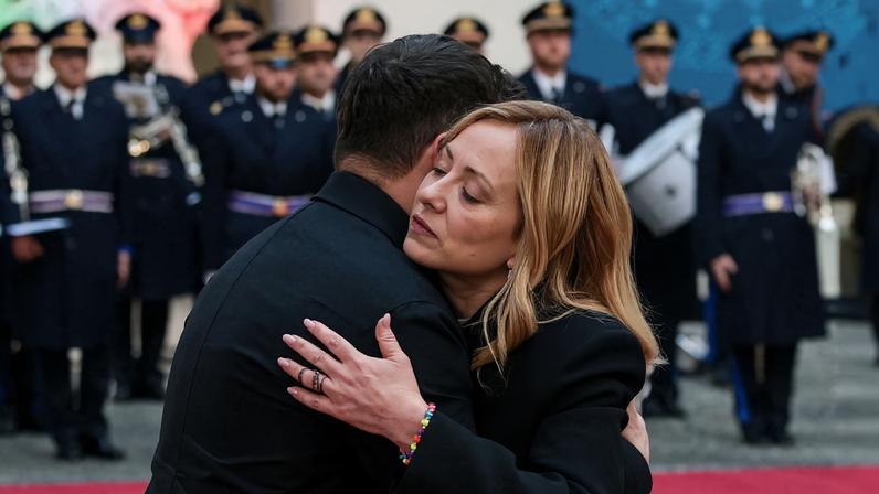 Ukraine's President Volodymyr Zelenskiy hugs Italy's Prime Minister Giorgia Meloni as they meet at Chigi Palace in Rome, Italy. REUTERS/Francesco Fotia
