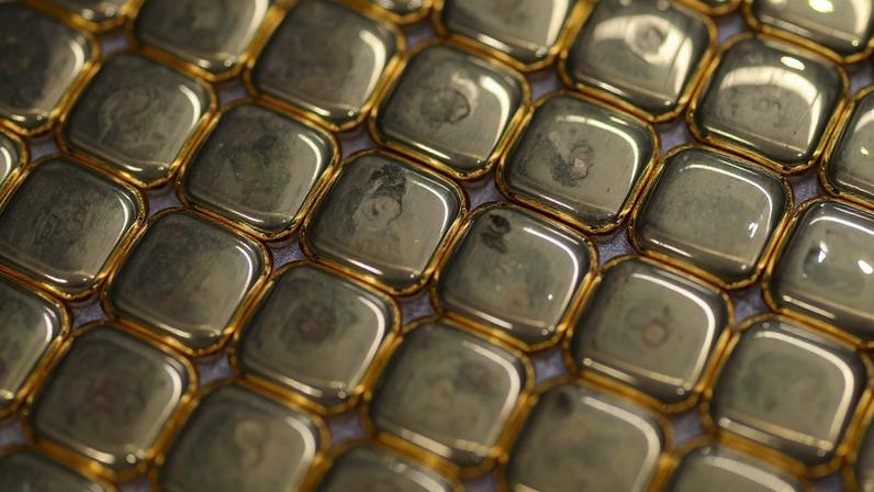 One-ounce gold bullion bars lie ready for stamping during production at ABC Refinery in Sydney, Australia, October 13, 2025. REUTERS/Hollie Adams/File Photo