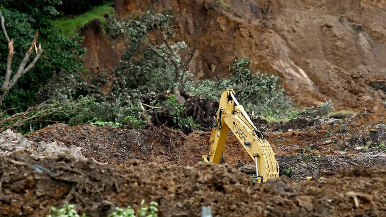 Heavy machinery has been brought in at the scene of a landslide triggered by heavy rains on January 23, in Mount Maunganui, New Zealand, January 24, 2026. REUTERS/David Rowland/File Photo