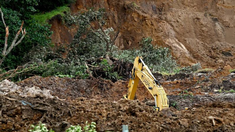 Heavy machinery has been brought in at the scene of a landslide triggered by heavy rains on January 23, in Mount Maunganui, New Zealand, January 24, 2026. REUTERS/David Rowland/File Photo