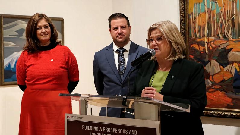 Canadian MPs Lisa Hepfner (left) and John-Paul Danko (centre) attend a press conference at the Art Gallery of Hamilton with its president and chief executive Shelley Falconer (right)