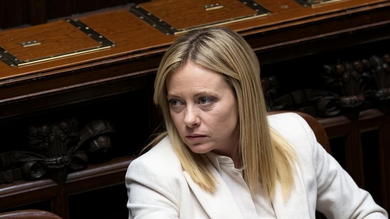 Italy's Prime Minister Giorgia Meloni looks on as she appears at the at the lower house of Parliament, ahead of a European Union leaders' summit, in Rome, Italy, December 17, 2025. REUTERS/Remo Casilli/File Photo
