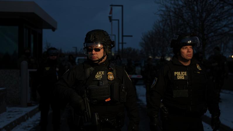 Federal Protective Service (FPS) agents stand guard outside the Bishop Henry Whipple Federal Building during a protest against increased immigration enforcement, days after a U.S. Immigration and Customs Enforcement (ICE) agent fatally shot Renee Nicole Good, in Minneapolis, Minnesota, U.S., January 10, 2026.