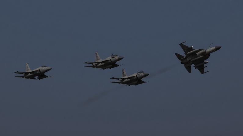 Pakistan Air Force's JF-17 Thunder jets fly past during the sea phase of Pakistan Navy's Multinational Exercise AMAN-23, in the North Arabian Sea near Karachi, Pakistan, February 13, 2023. REUTERS/Akhtar Soomro/File Photo