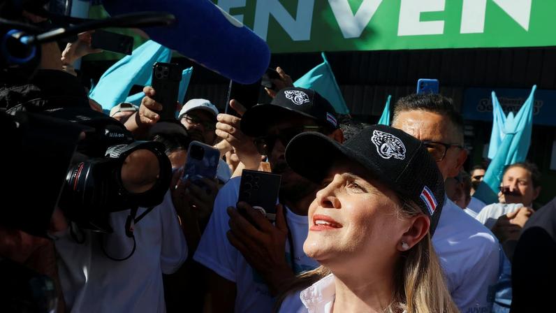 Costa Rican presidential candidate Laura Fernandez of the Sovereign People's Party (PPSO) talks to the press during a campaign rally, in San Jose