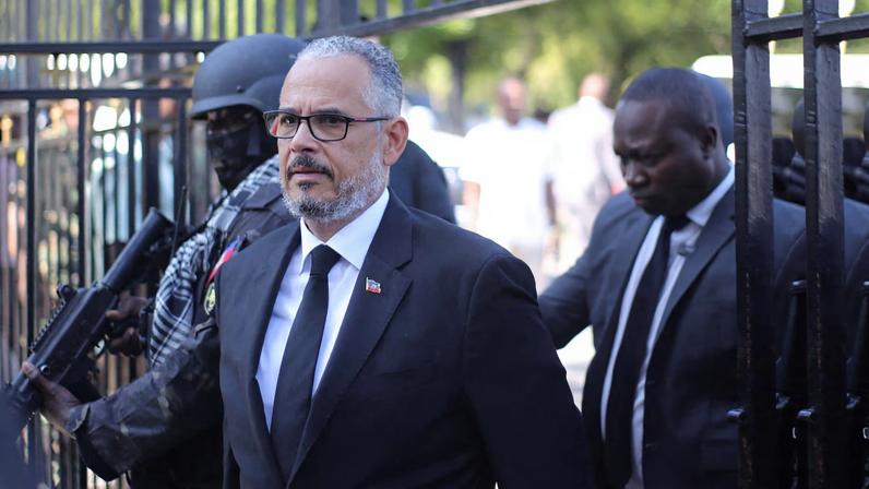 Haiti's Prime Minister Alix Didier Fils-Aime walks as he attends a Mass in honor of Pope Francis at Saint Pierre church in Petionville, Port-au-Prince, Haiti, April 25, 2025. REUTERS/Jean Feguens Regala/File Photo